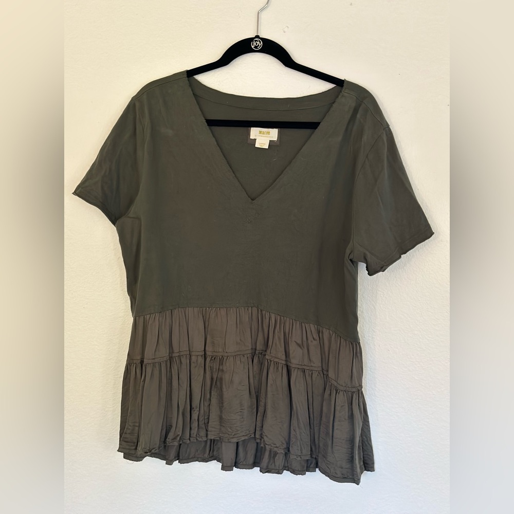 Green peplum top with satin ruffled bottom. Really cute and very comfy.